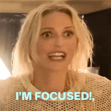 a woman says i 'm focused while making a funny face