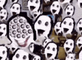 a group of ghosts are standing in a room with their mouths open and looking at the camera .