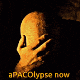 a man covering his face with his hand with the words apacolypse now written below him