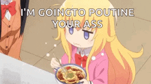 a little girl is sitting at a table eating a bowl of spaghetti .