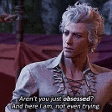 a man with white hair is talking to another man in a tent .
