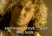 a man with curly hair says " anything steve ... just one sign "