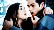 a man and woman are looking at each other