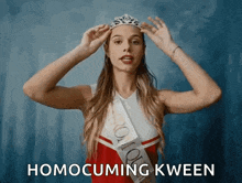 a cheerleader is wearing a tiara and a sash that says homocuming kween