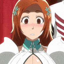a close up of a girl with a flower on her hair