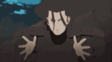 a man in a black shirt is making a hand gesture with his fingers