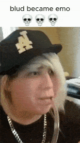 a person wearing a hat with a letter a on it