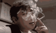 Gysj Smoke GIF - Gysj Smoke Cigarette GIFs