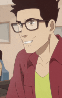 a man with glasses and a yellow shirt is smiling