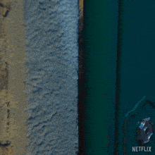 a woman peeking through a green door with netflix written on the bottom right