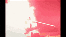 a person is standing in front of a red and white explosion