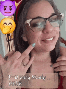 a woman wearing glasses says f-u very nicely while giving the middle finger