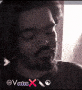 a close up of a man 's face with the words vortex x on the bottom right