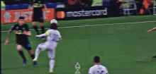 a soccer game is being played in front of a ps5 sign