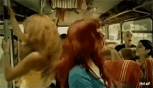 a group of people on a bus with the url rbd.gif below them