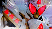 a close up of a robot 's face with red eyes