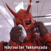 a devil talking on a cell phone with the words " não vai ter tekkenzada " on the bottom