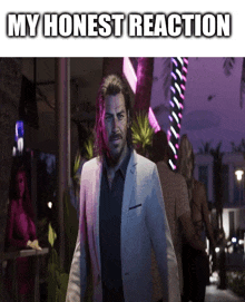 a man in a white suit is standing in front of a sign that says my honest reaction