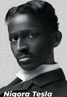 a black and white photo of nigora tesla in a suit and tie
