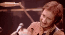 Tambourine Pete Townshend GIF - Tambourine Pete Townshend The Who GIFs