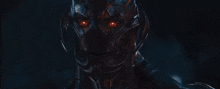 a close up of a person with sparks coming out of their mouth .