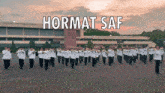 hormat saf is written above a group of men in uniform