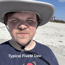 a man wearing a hat and typical fivem dev shirt