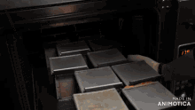 a bunch of boxes are in an oven with a digital display that says 179