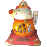 a statue of a cat has chinese writing on it
