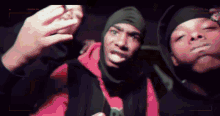 a group of men are taking a selfie with a camera that says " camera on "