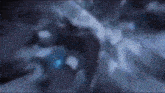 a blurry picture of a person standing in a dark room