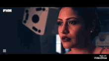 a video showing a woman with fhm written on the top