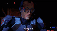 a person is holding a sword in a dark room with blue lights behind them