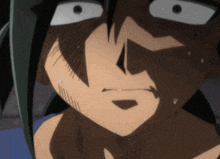a close up of a person 's face with a surprised look on it