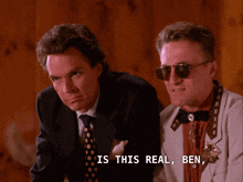 two men sitting next to each other with the words is this real ben