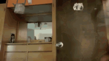 a person is standing in front of a door with a sticker on it