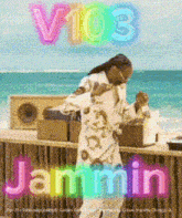 a poster of a man dancing on the beach with the words v103 jammin on it