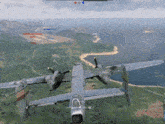 a video game shows a plane flying over a lush green field