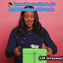 a woman in a blue sweater is holding a green gift box with the words enter now to win 1 of $ 1,000 inique gift cards