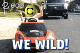 a picture of a red car with the words we wild on it