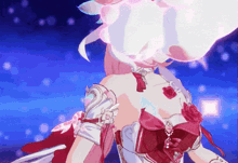 a girl in a white dress with a red bow on the back