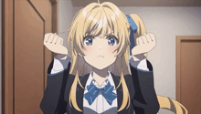 a girl with blonde hair and blue eyes is wearing a school uniform