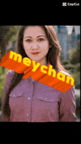 a woman in a purple shirt with the name meychan on it