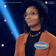 a woman with a name tag that says adrienne on it