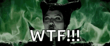 a black and white photo of a woman with horns and the words `` wtf !!! '' .