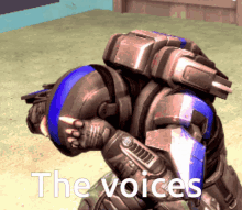 a video game character with the words " the voices " written below him