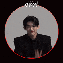 a man in a black suit is in a circle with choom written on it