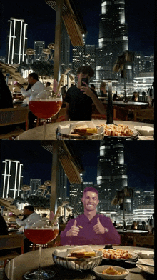 a man in a purple shirt is giving a thumbs up in front of a city skyline