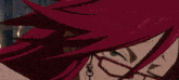 a cartoon character with red hair and glasses is making a funny face .