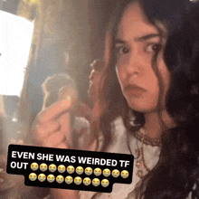 a woman with a sticker that says even she was weirded tf out